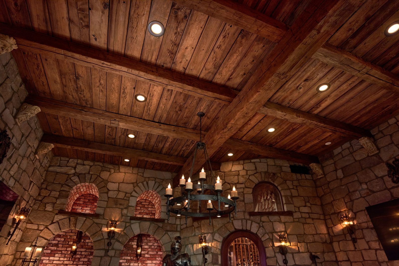 Castle Room ceiling detail with reclaimed wood and stone arches