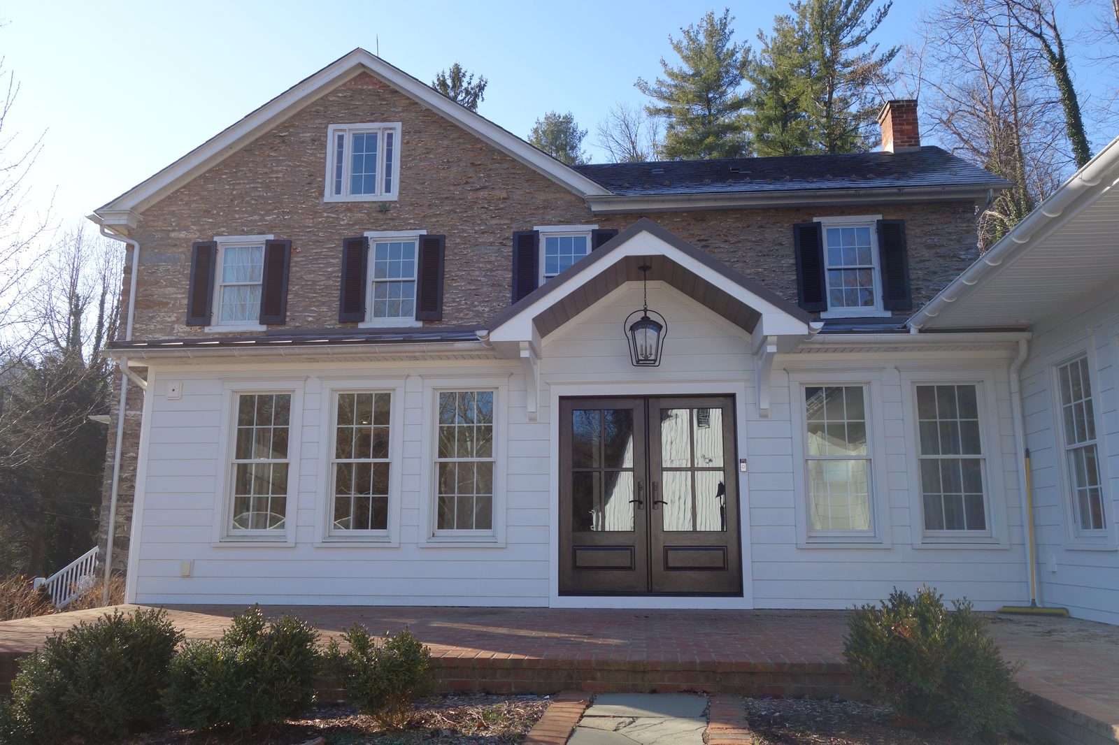 1770 stone farmhouse front elevation with new attached wing