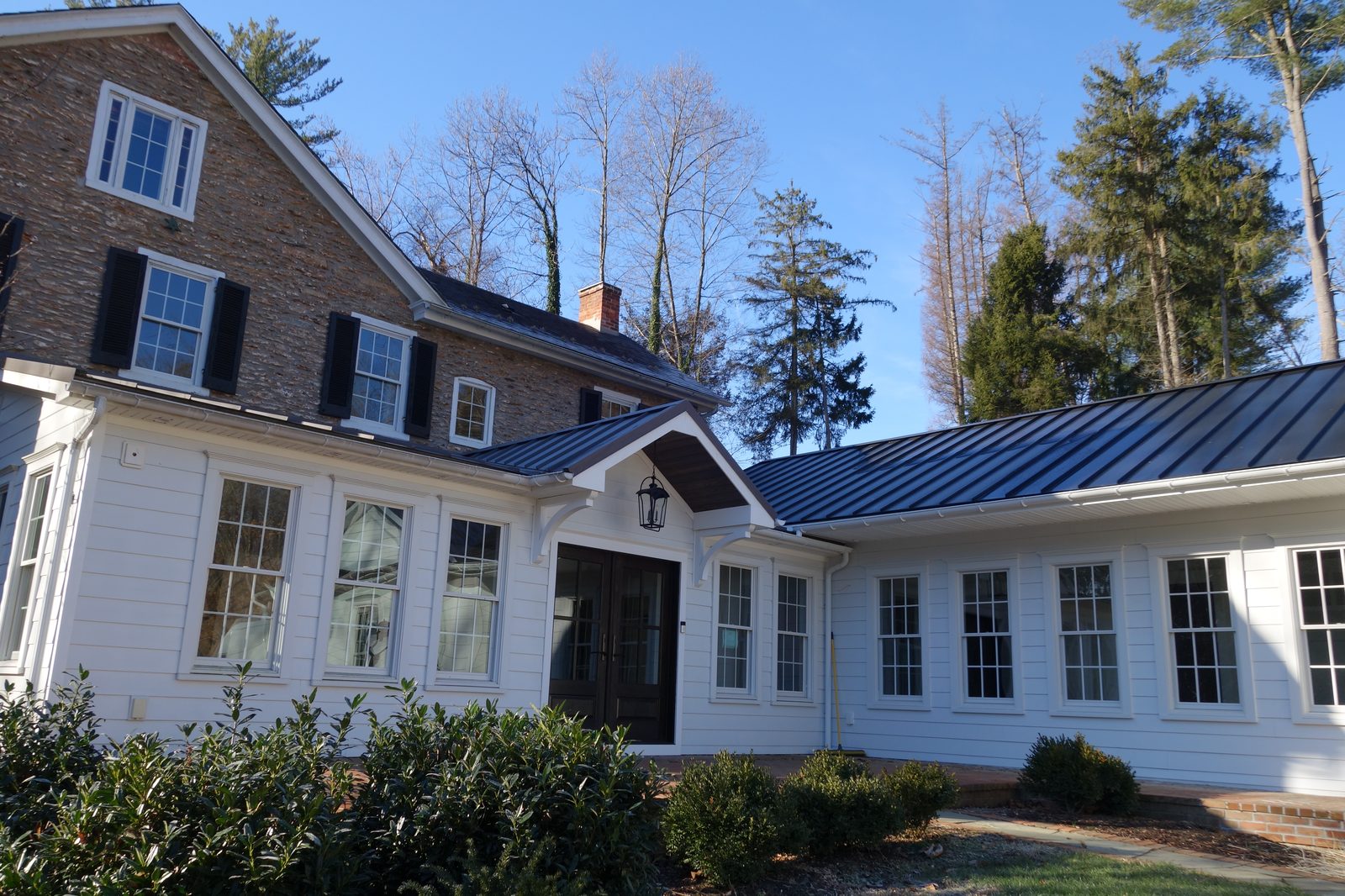 Rear view of the farmhouse showing the new addition