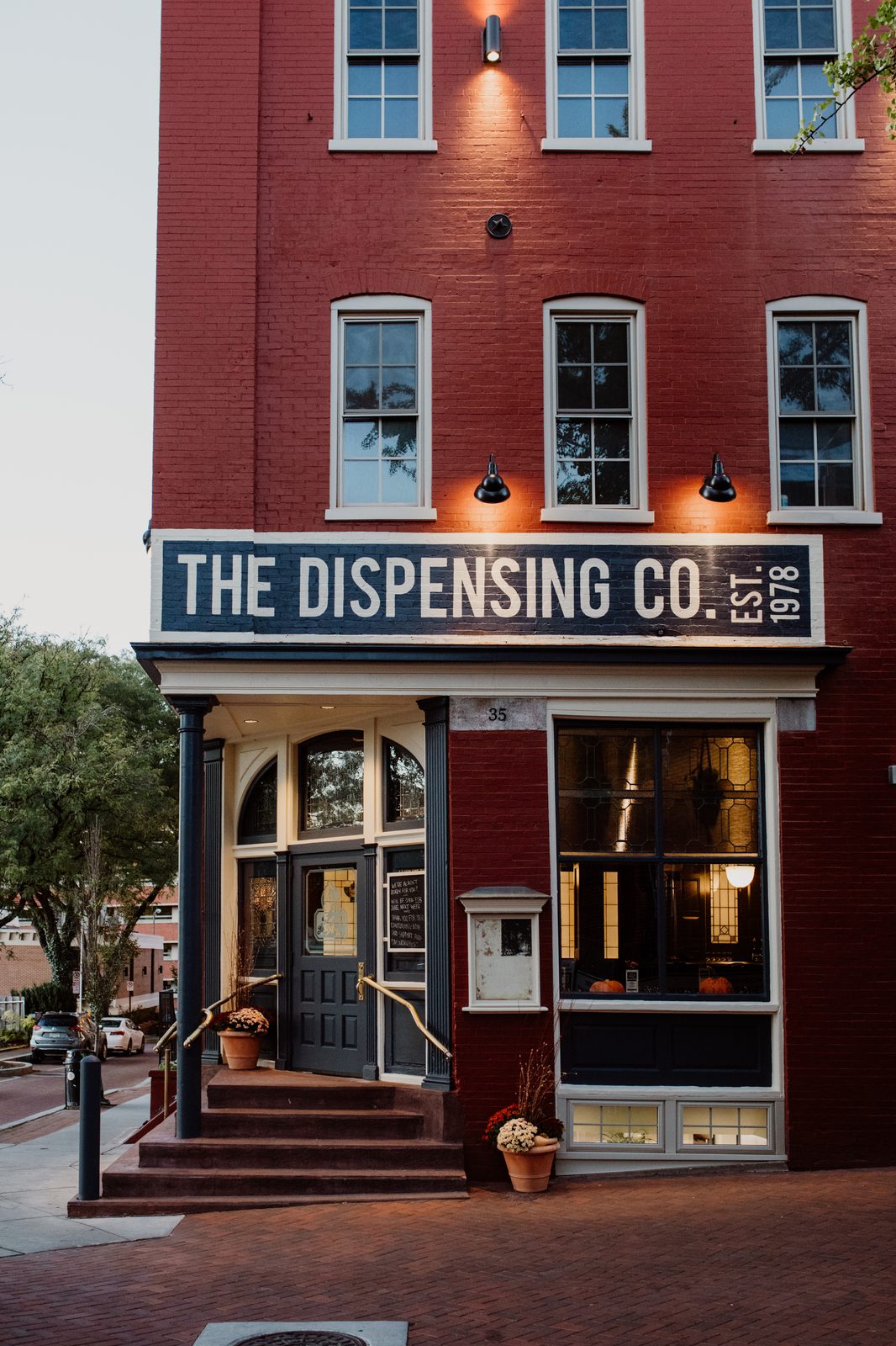 The Lancaster Dispensing Co. brick storefront with original signage