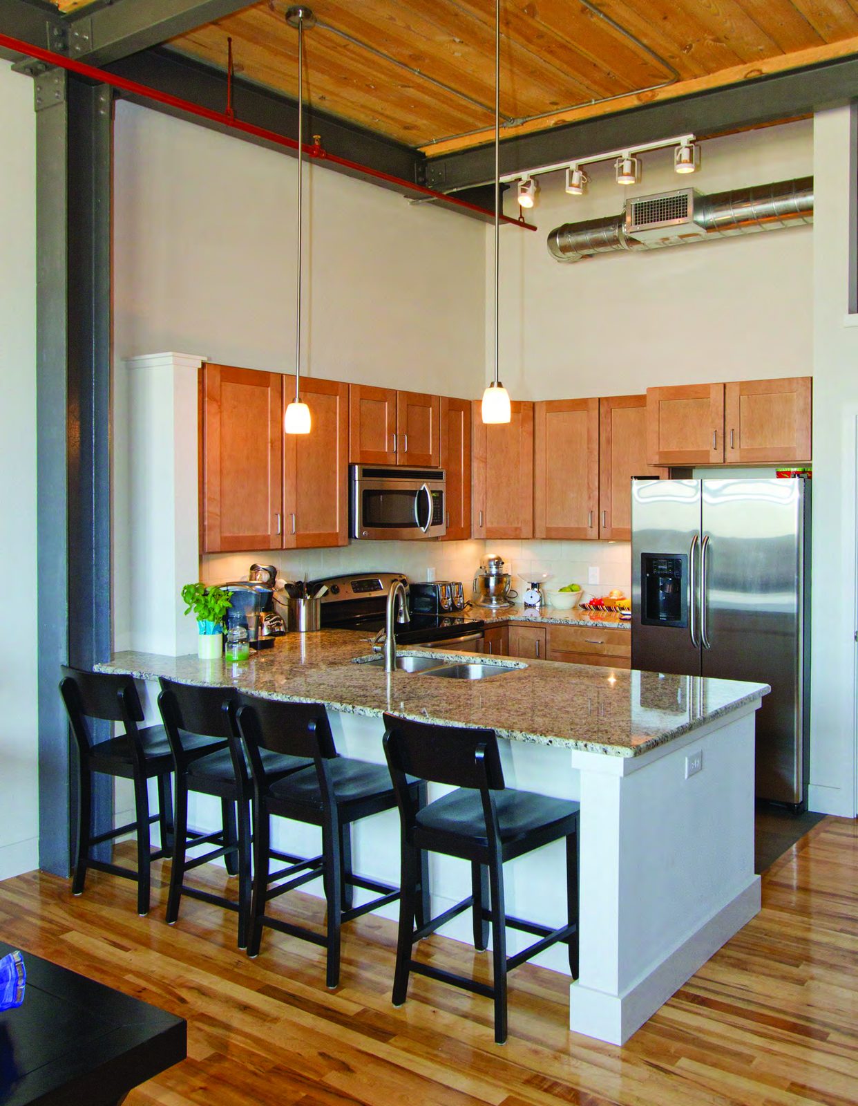 Loft living area with exposed brick