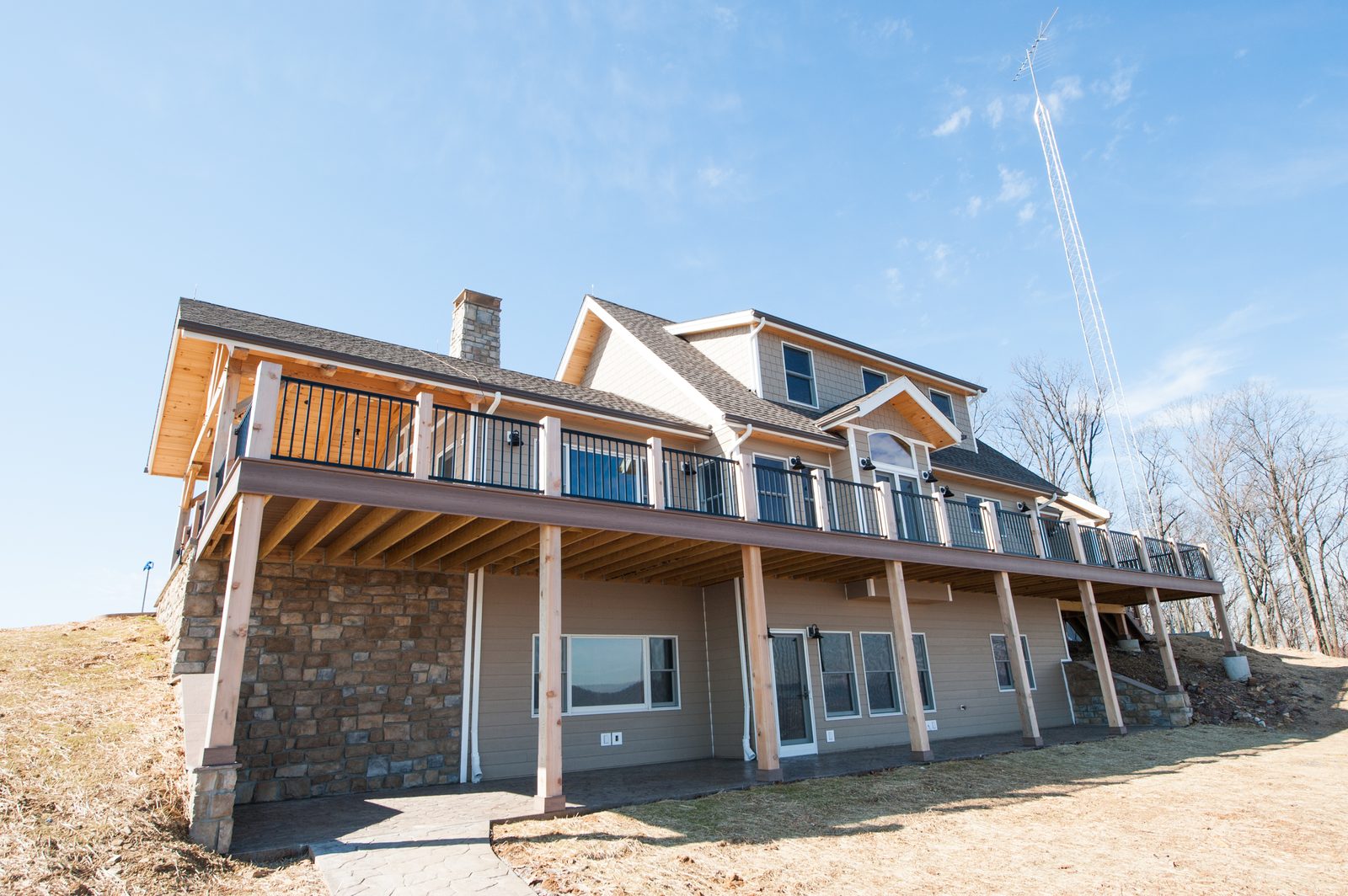 Custom timber-frame home exterior on a ridgeline above the Susquehanna