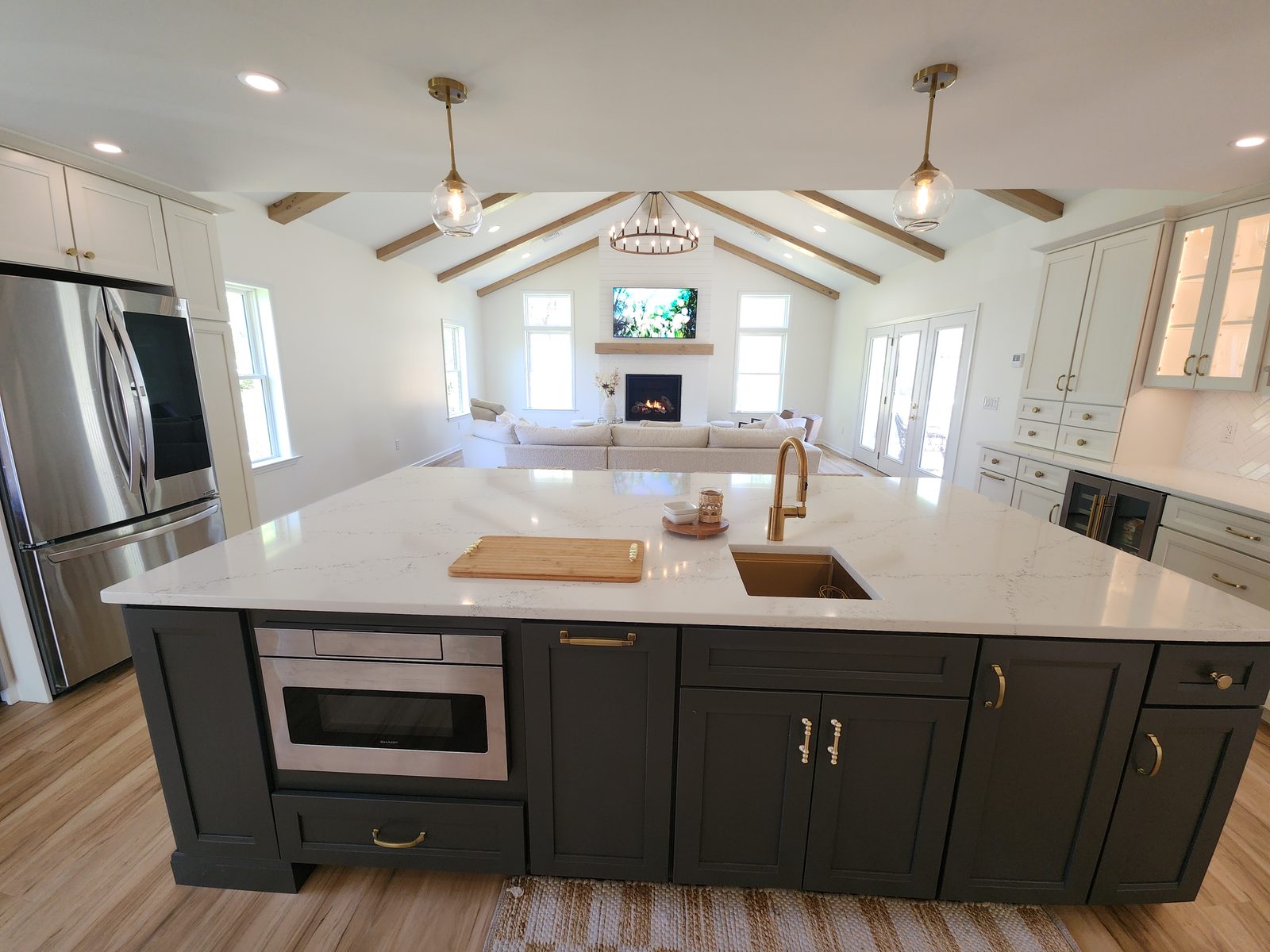 Great room living area with vaulted ceiling